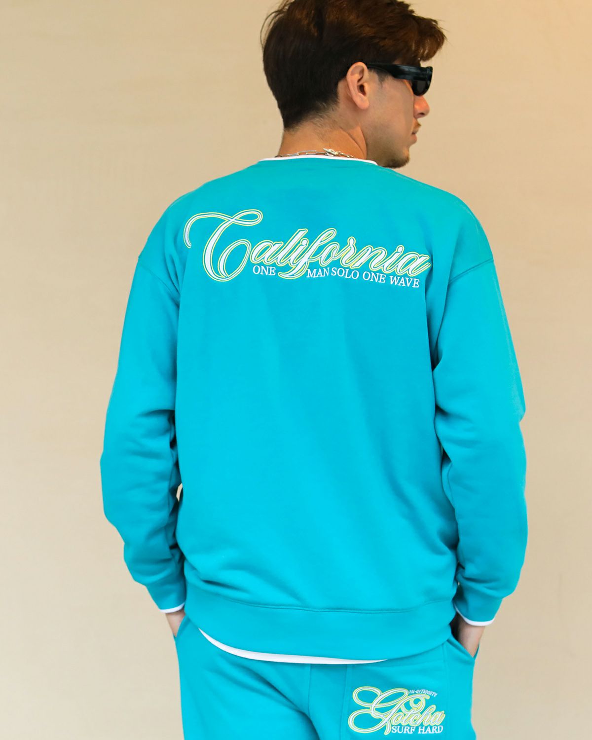 ターコイズ：180cm/70kg(Lサイズ着用)