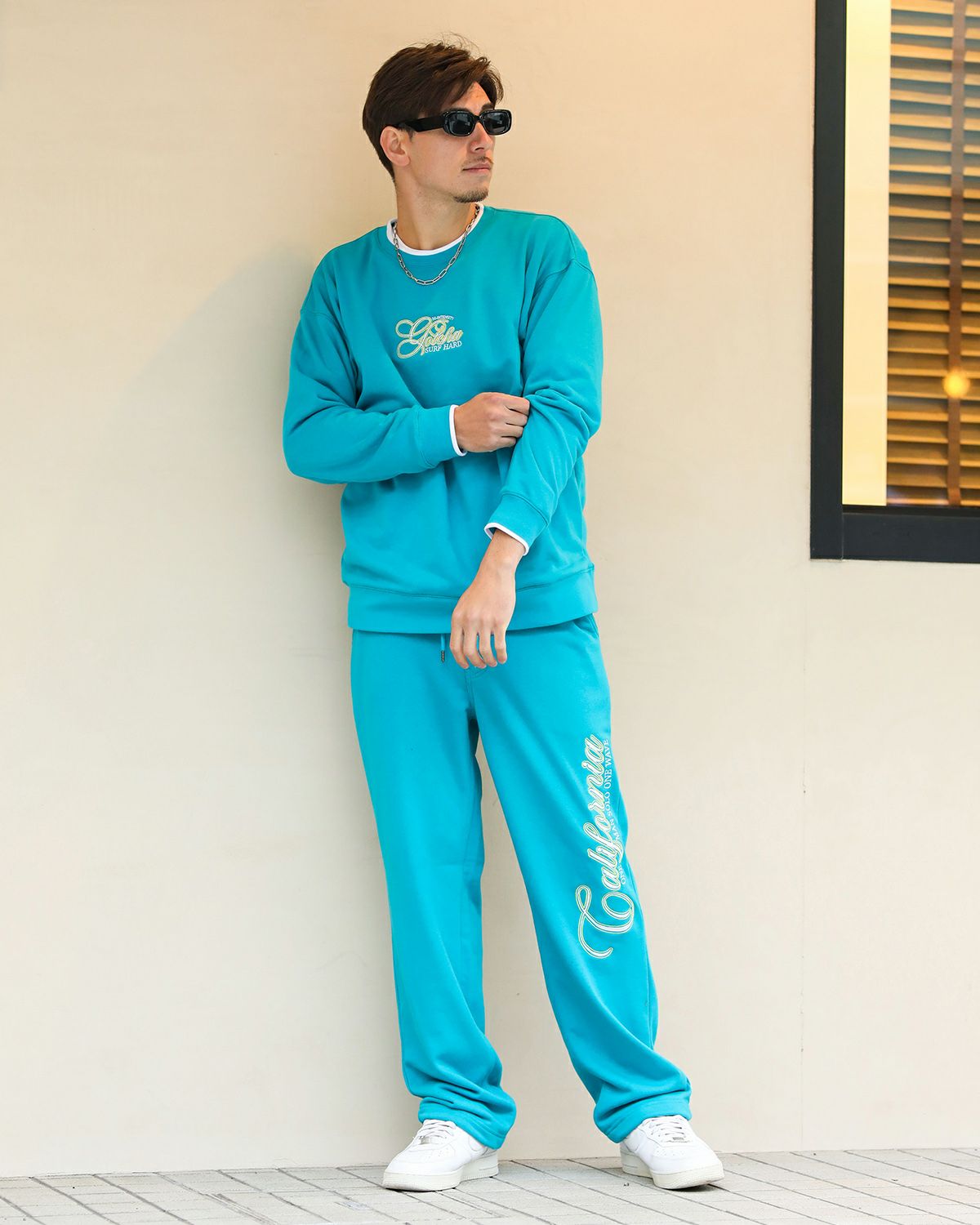 ターコイズ：180cm/70kg(Lサイズ着用)